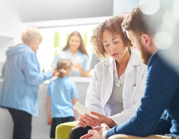 pharmacist advising patient 