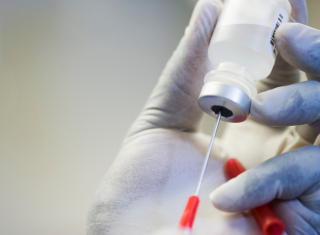 Pneumoccocal vaccine in the hand of a pharmacist